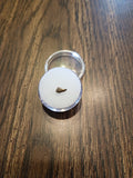 This is a 5/16" long Raptor tooth from the Hell Creek formation in Garfield County, Montana. It is in great condition with no significant repair or restoration L-5/16" W-1/8" Anterior-0%