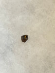 Found in the Hell Creek Formation, these dinosaurs with parrot-like beaks, are a rather uncommon find. This tooth is in good condition.  Length 1/4"  Width 1/4"