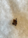 This is a Triceratops Tooth from the Hell Creek Formation in Garfield County, Montana. It is in good condition with no significant repair or restoration.  Length- 3/4" Width -1/2"