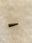 This Ricardo tooth was collected from the Hell Creek formation in Garfield County, Montana. It is in good condition with no significant repair or restoration.  Length ~ 5/8" Width ~ 1/4"