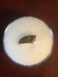 Paronychodon was a small theropod dinosaur genus, from the late cretaceous period, 75-66 million years ago.  This tooth was found in Garfield County Montana.  Length- 3/8inch  Width-1/8inch 