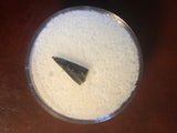 This Ricardo tooth was collected from the Hell Creek formation in Garfield County, Montana. It is in good condition with no significant repair or restoration.  Length ~ 3/8" Width ~ 1/8"